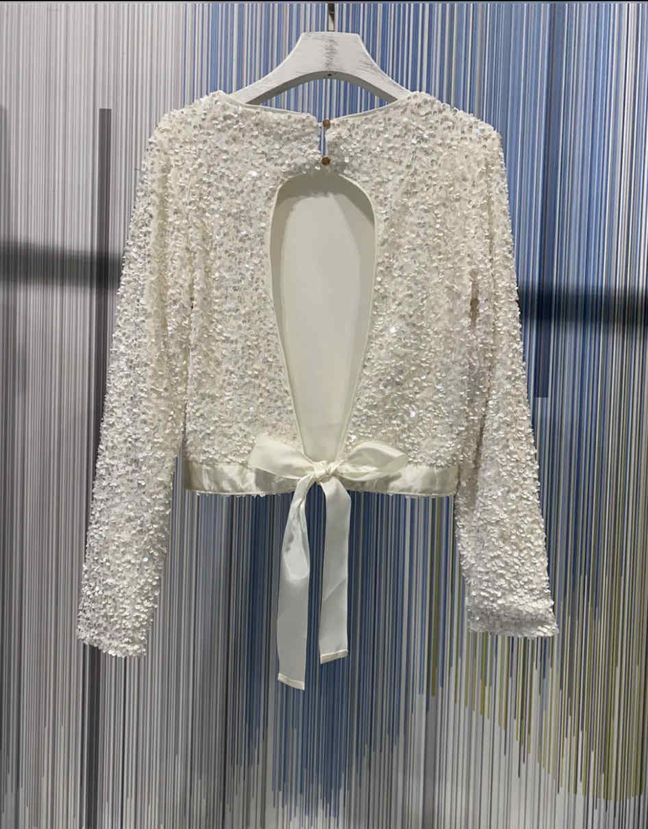 Witte pailletten blouse met strik