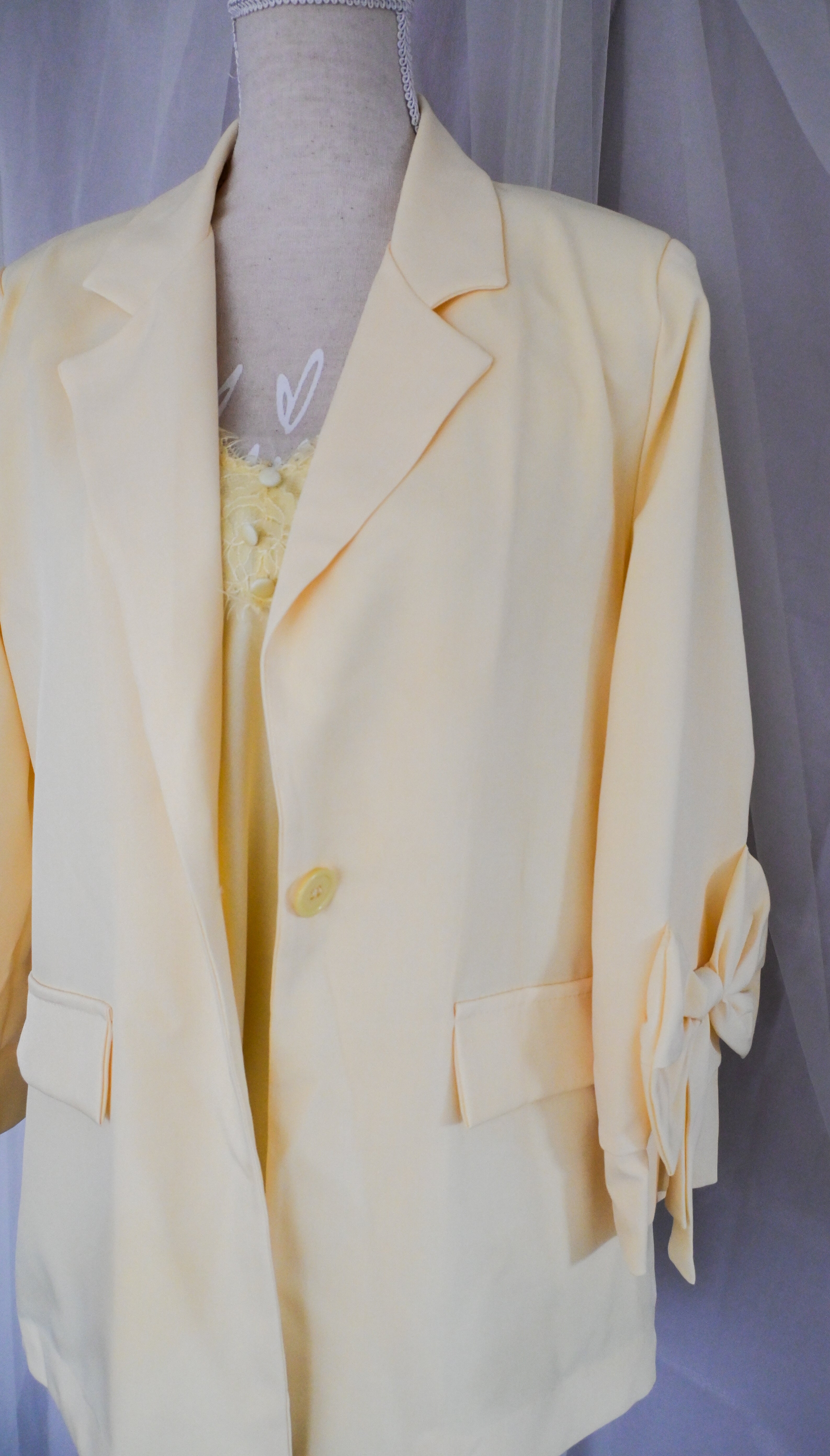 Yellow bow blazer