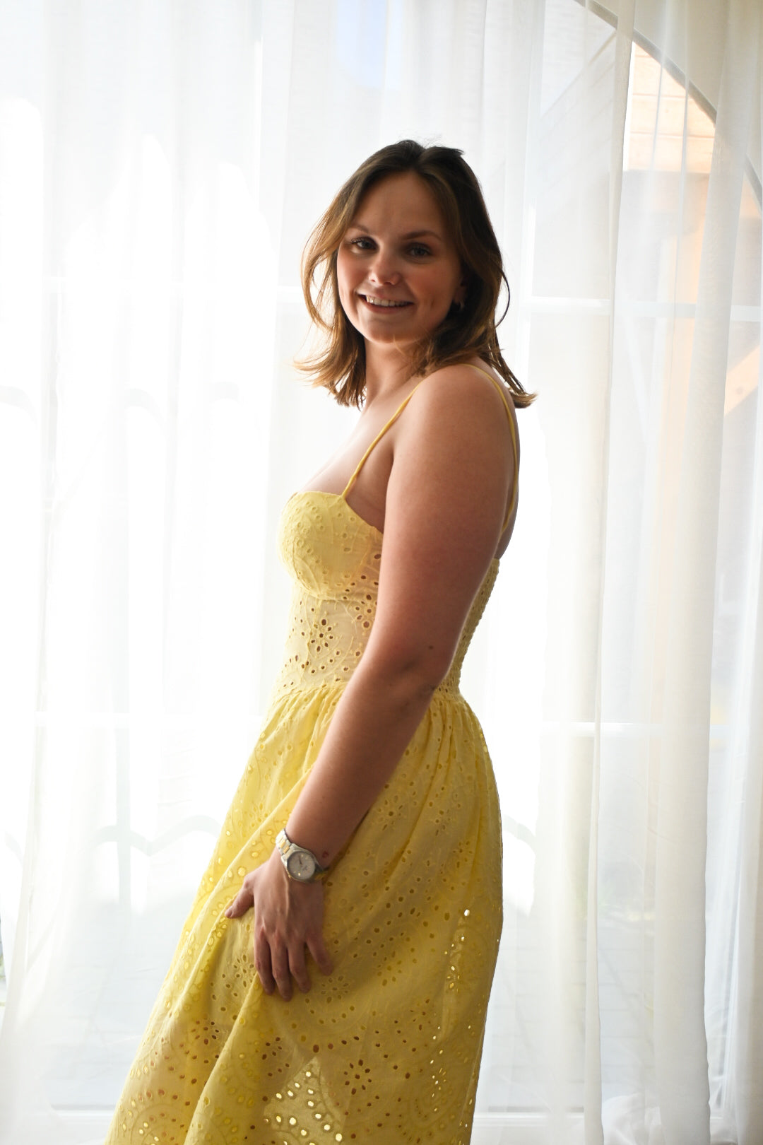 Long yellow broderie dress